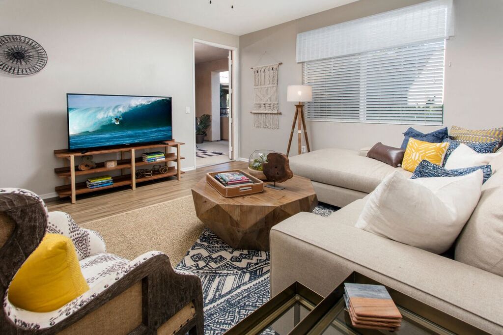 a living room with a couch and a television